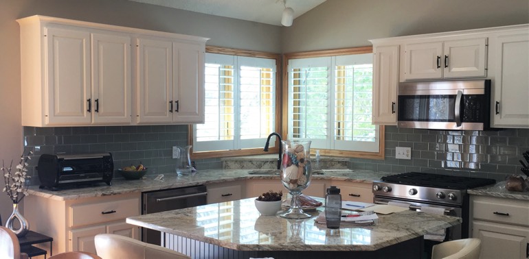 Bluff City kitchen with shutters and appliances